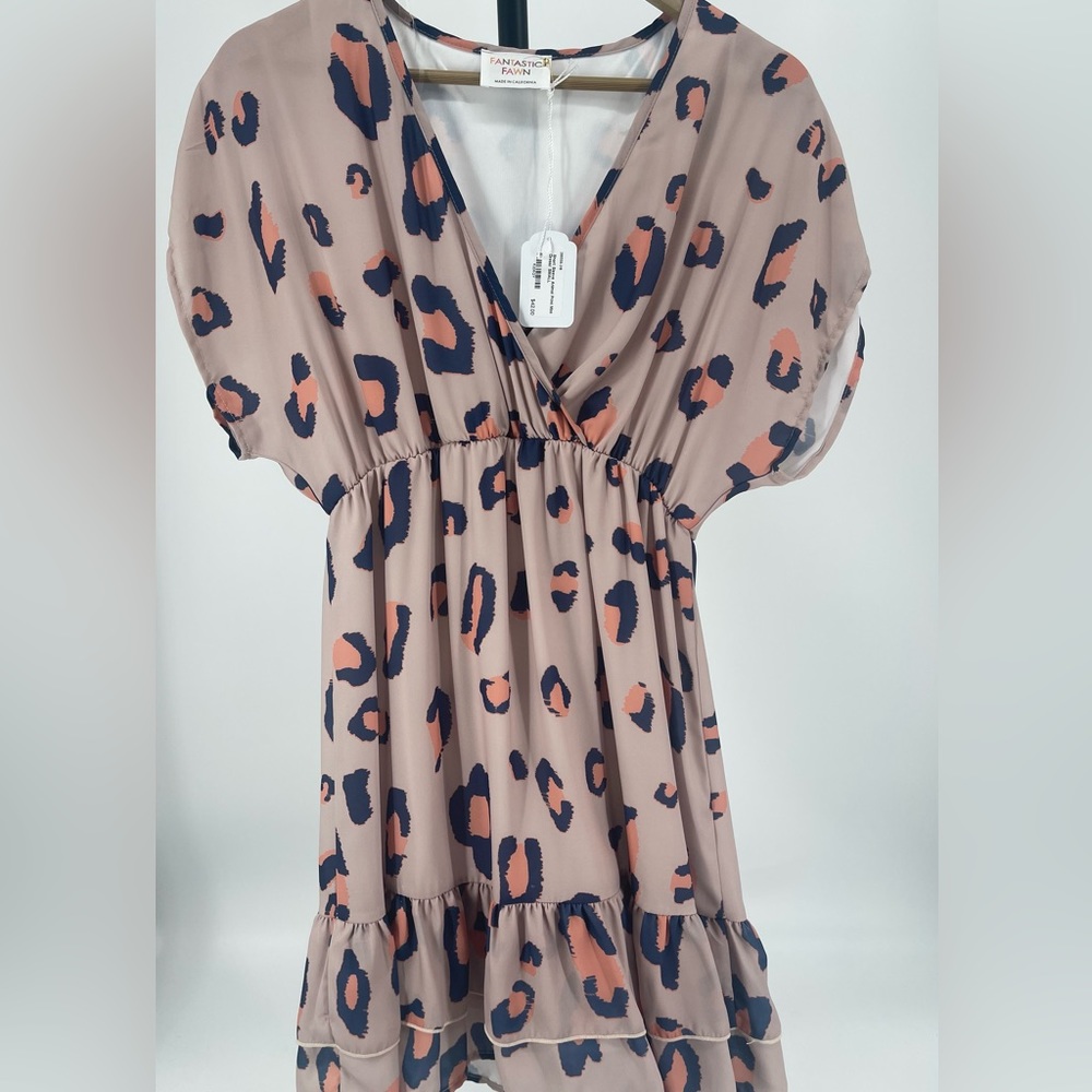 This adorable leopard print dress is perfect for Spring!
